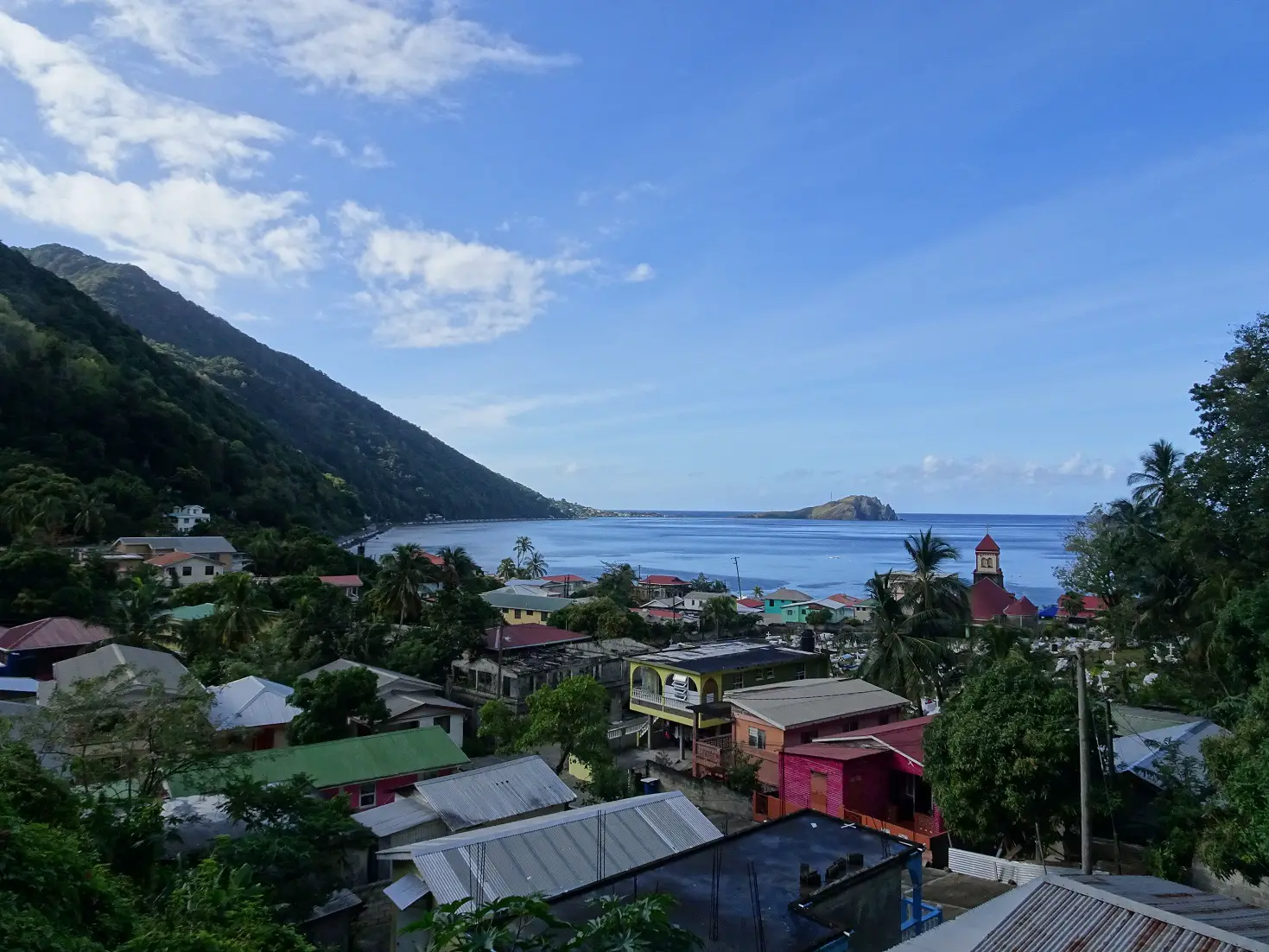A view of a colourful tropical village near the sea in Soufrière, Dominica