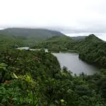 A mountain lake surrounded by tropical vegetation in Morne Trois Pitons National Park, Dominica