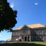 A reconstructed fort building near the ocean, at Fort Shirley near Portsmouth, Dominica