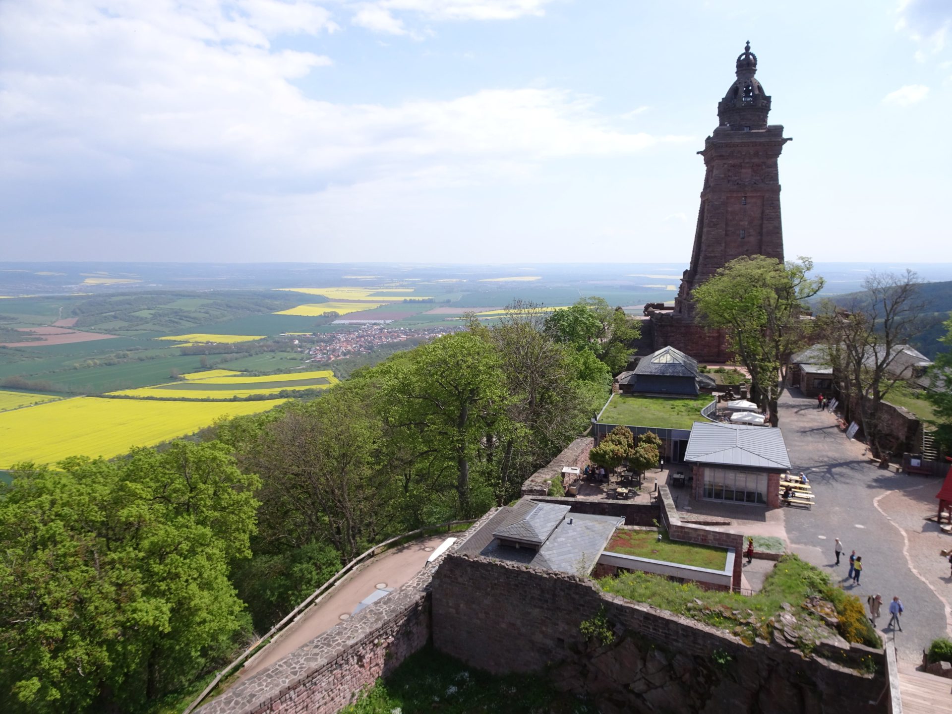 A huge sandstone monument towering over a plain