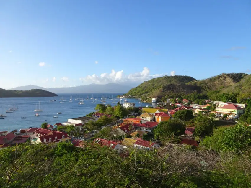 A small colourful village near a tropical bay