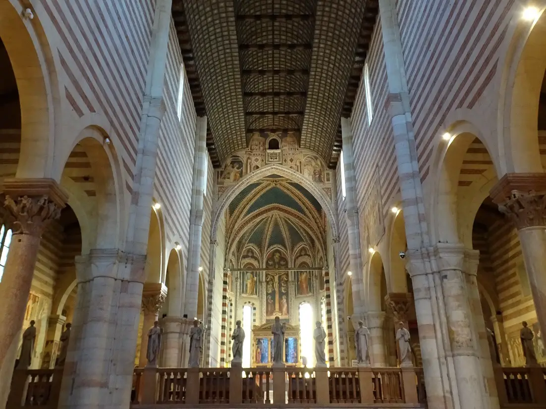 A bright church nave with a coffered ceiling