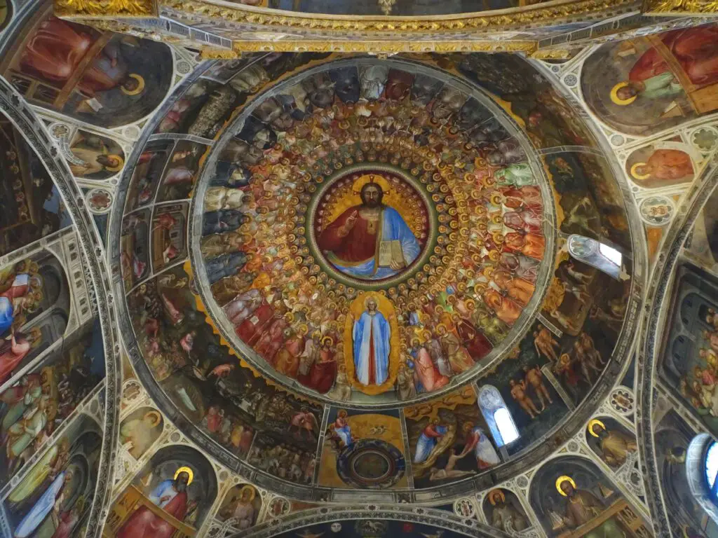 A frescoe of CHrist surrounded by hundreds of saints