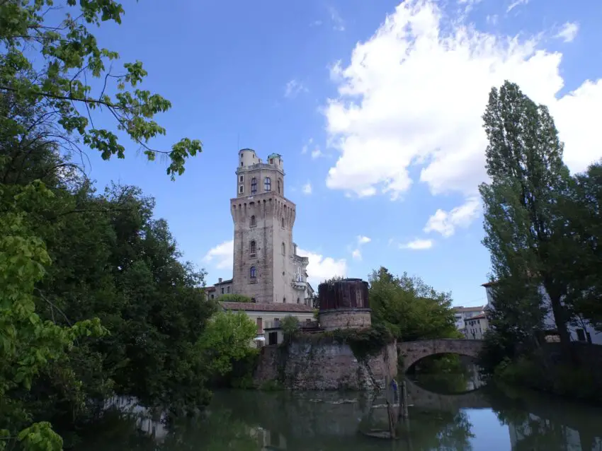 A medieval tower seen over a river