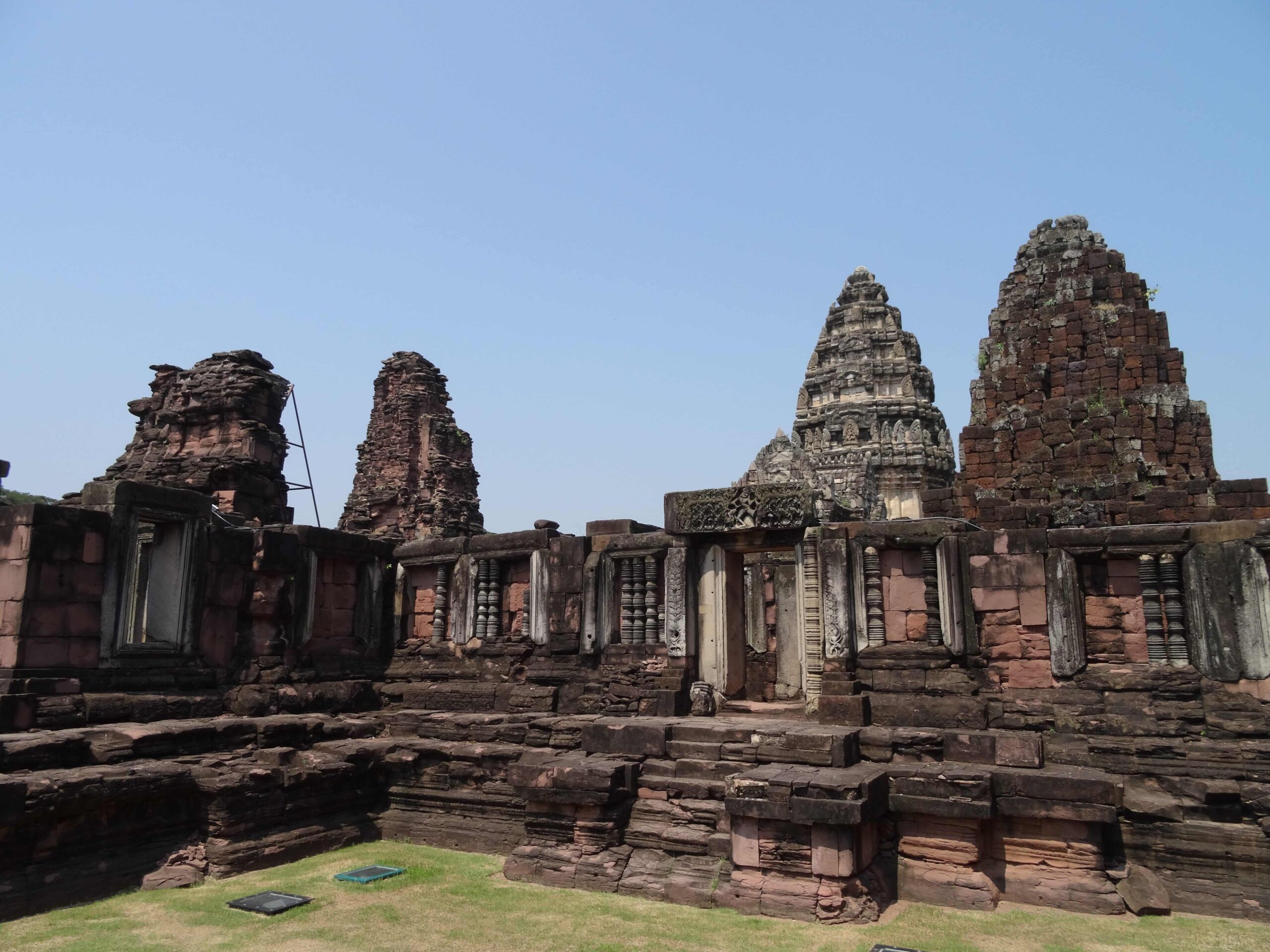 Carved sandstone towers of a Khmer temple