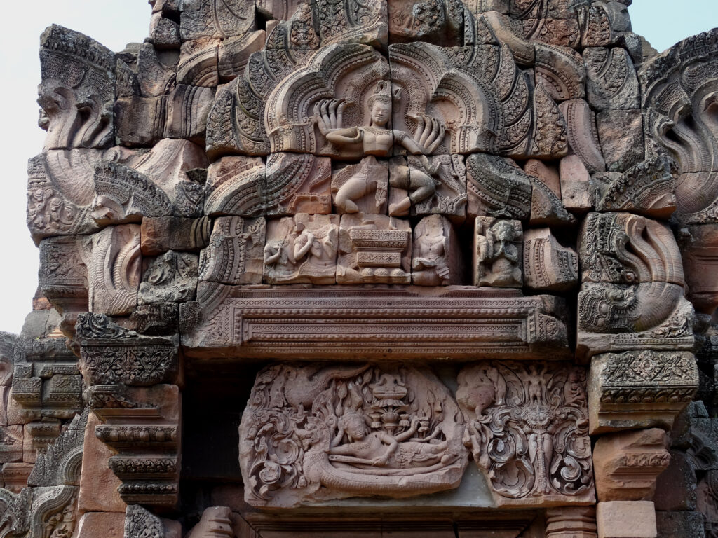 A stone relief of Shiva dancing