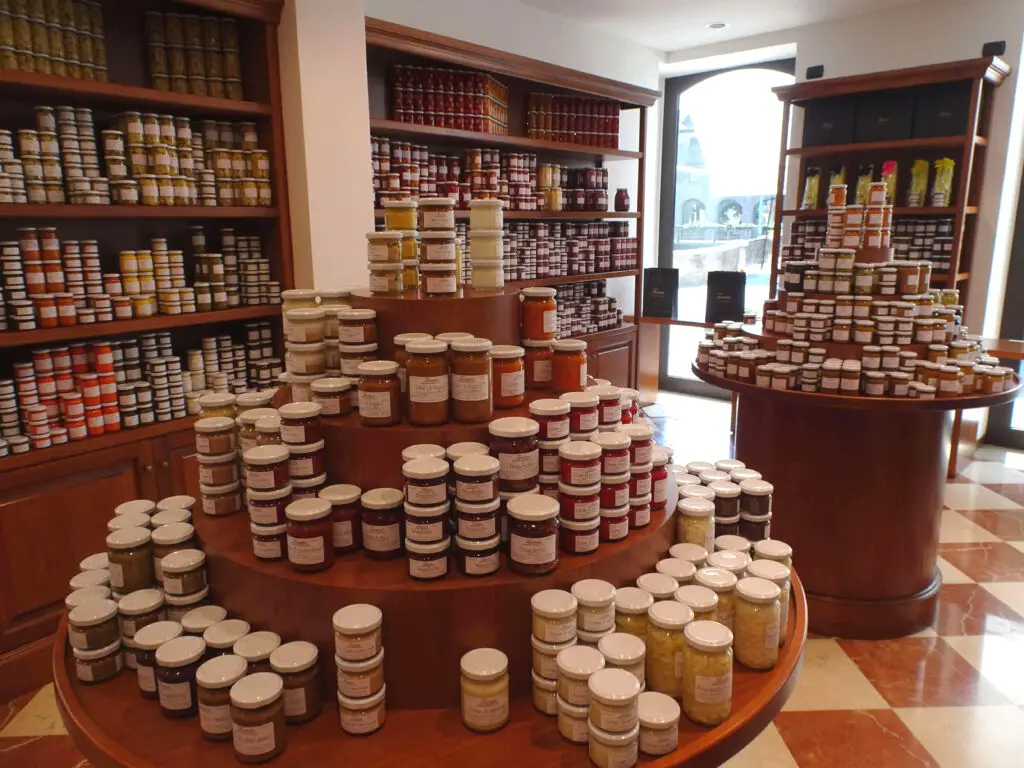 A shop display of countless jars of jams and pickles