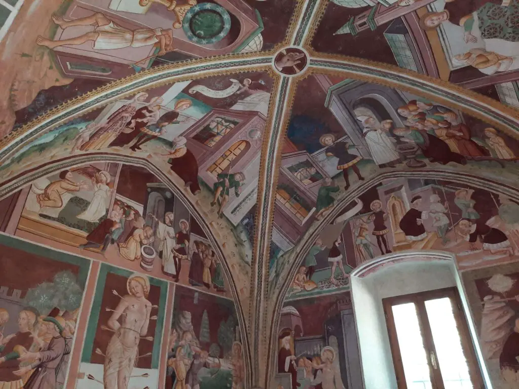 A small chapel covered in frescoes