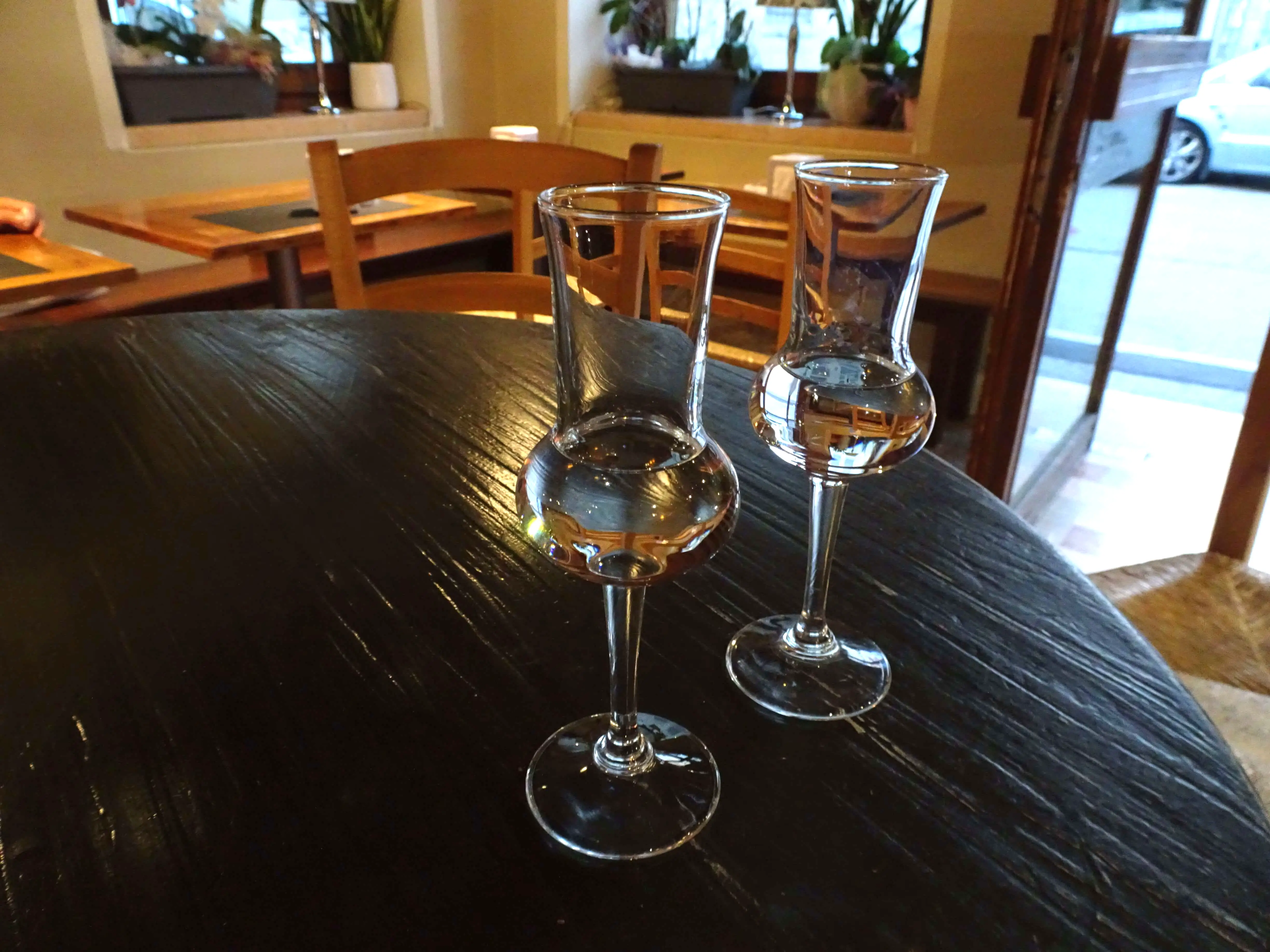 Two small glasses full of grappa