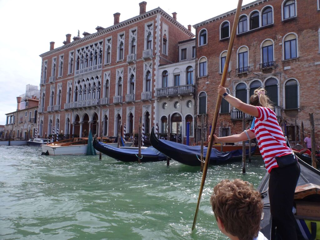 A Gondola being ferried over a canal