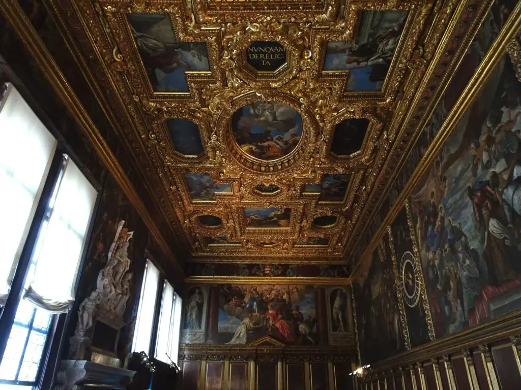 A stately room with an intricately painted ceiling