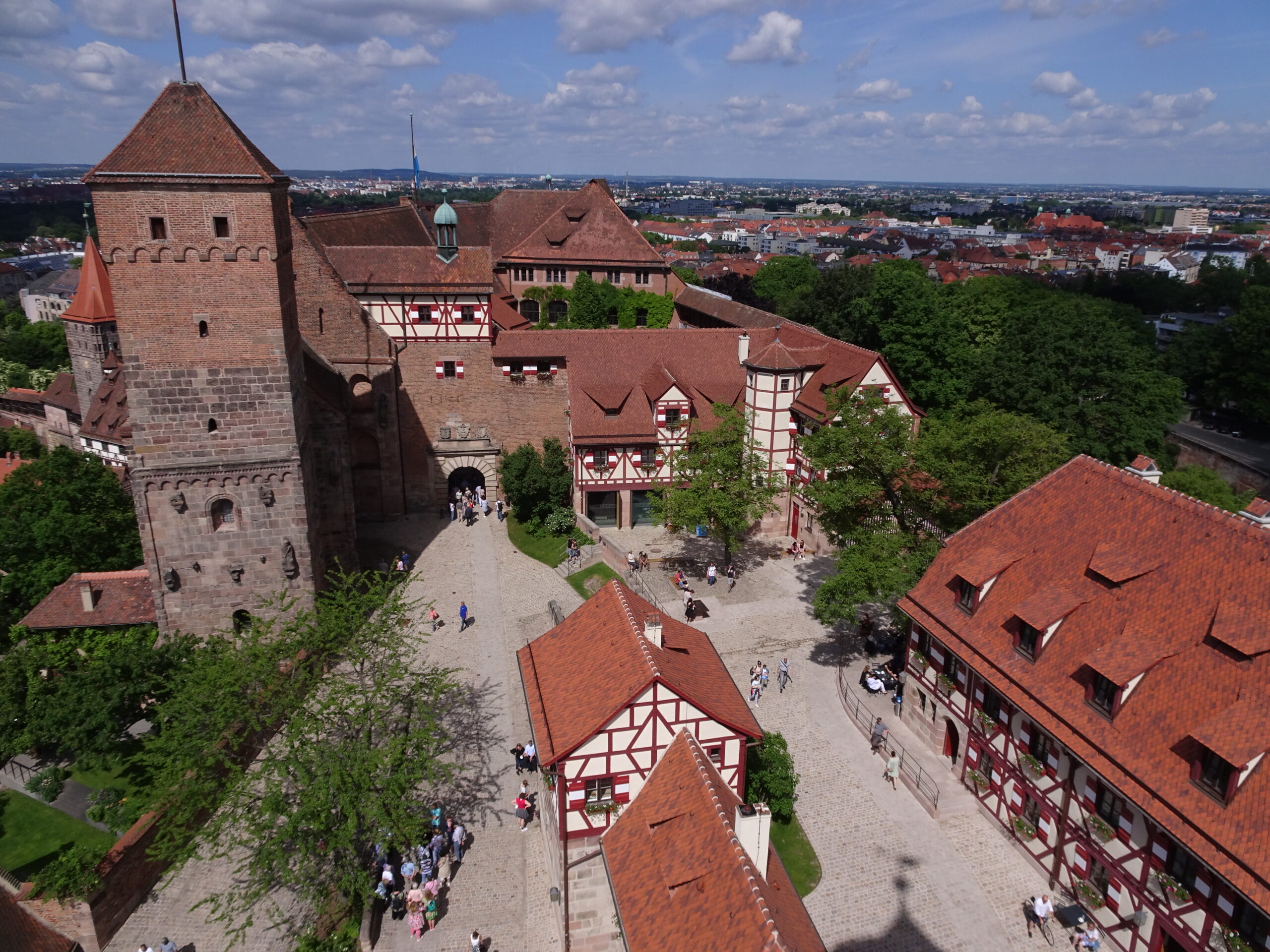 A medieval castle on a hill seen from above
