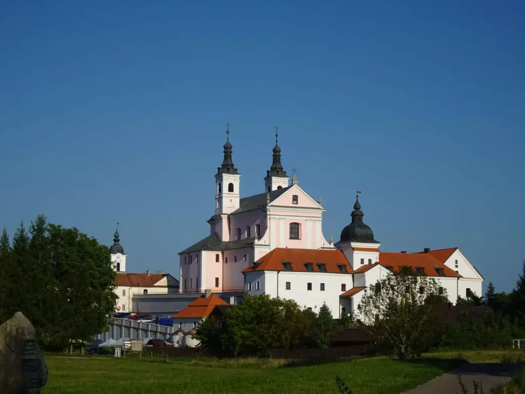 A grand monastery towering over the surrounding landscape