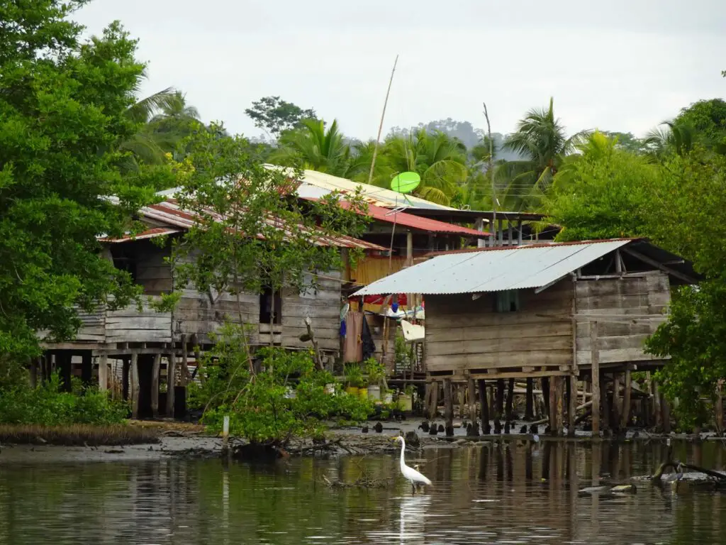 A stilted wooden house over the sea.