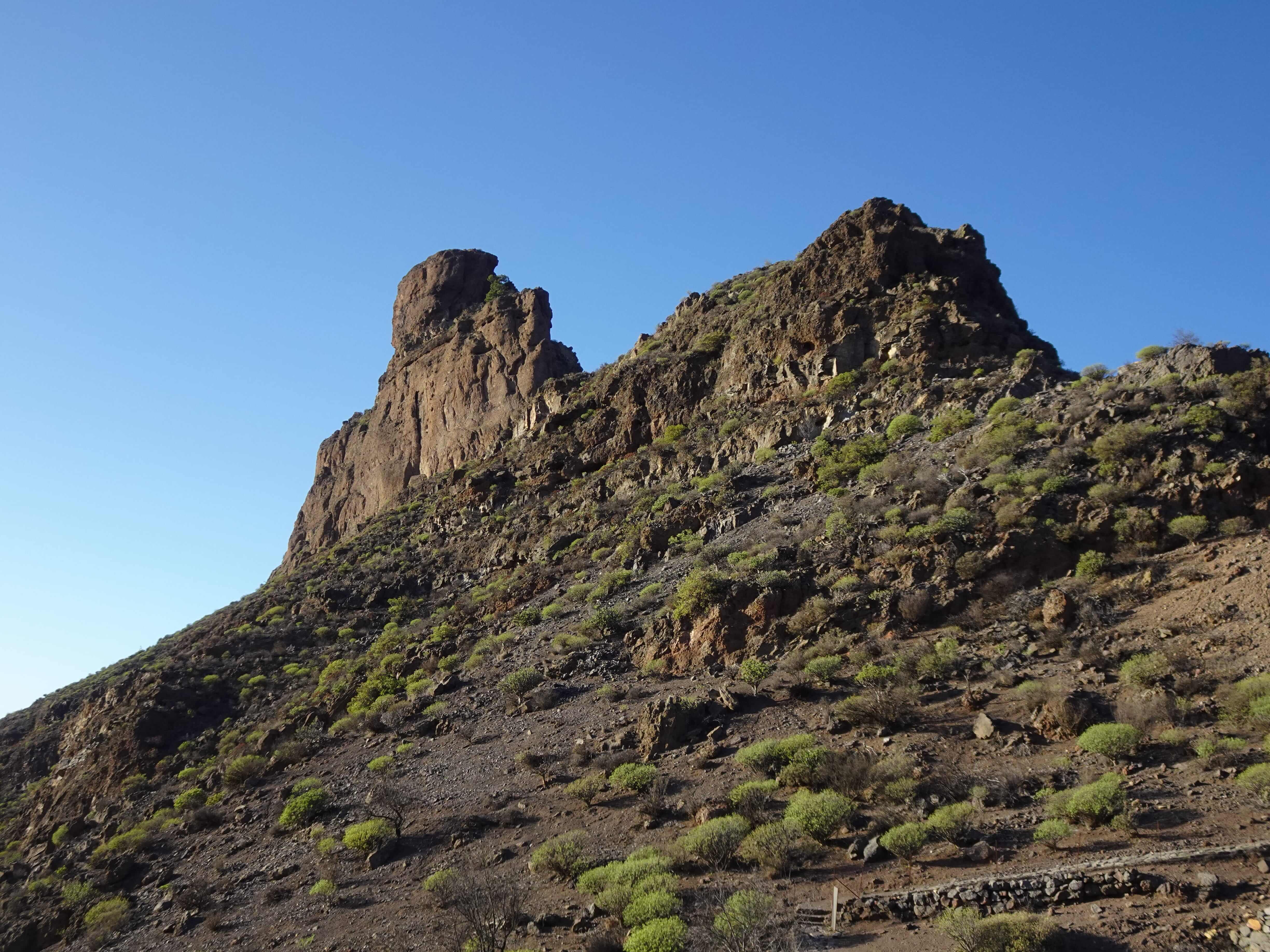 A prominent rock outrcrop seen from below