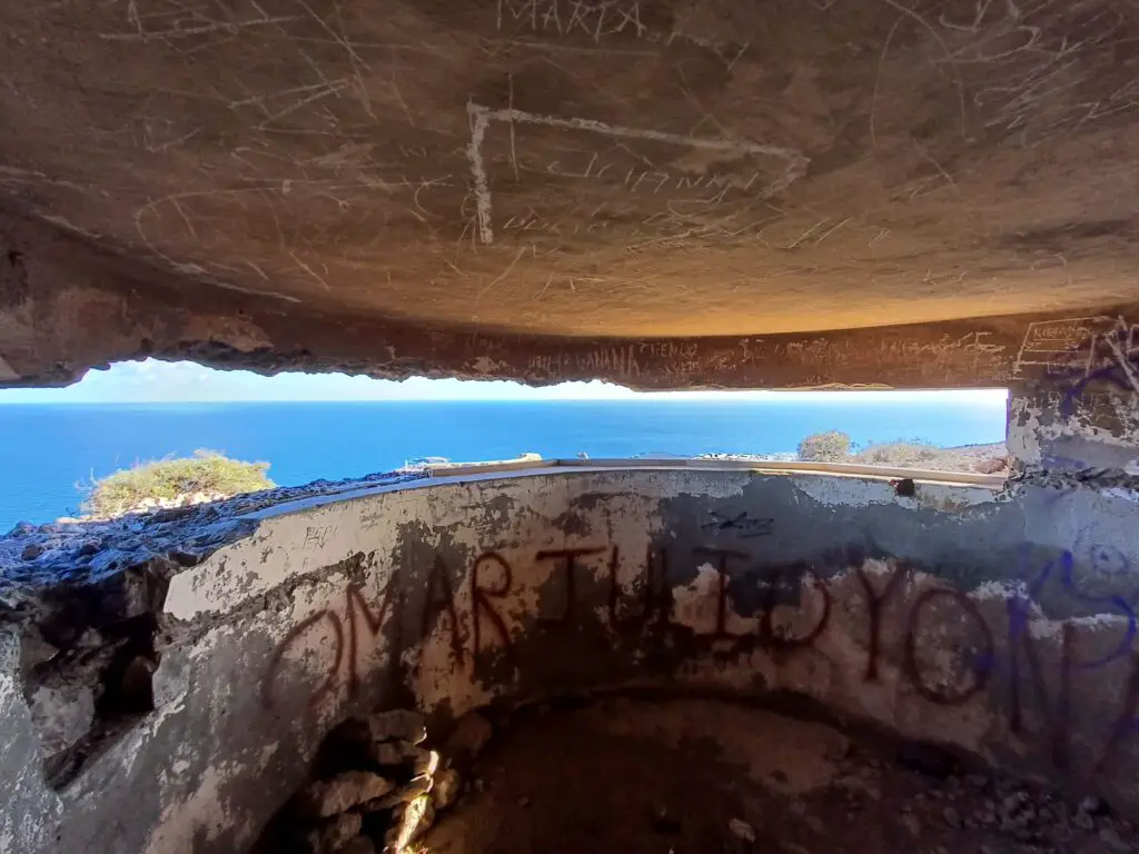 A view of the Ocean seen through the tiny slit of an old gun emplacement