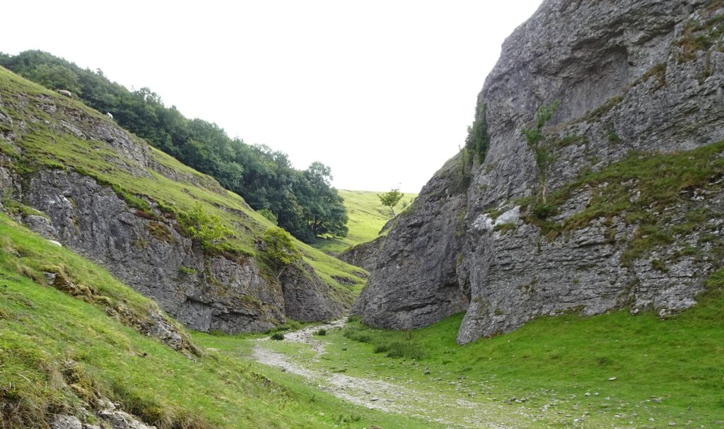 A narrow valley with rocky slopes on both sides
