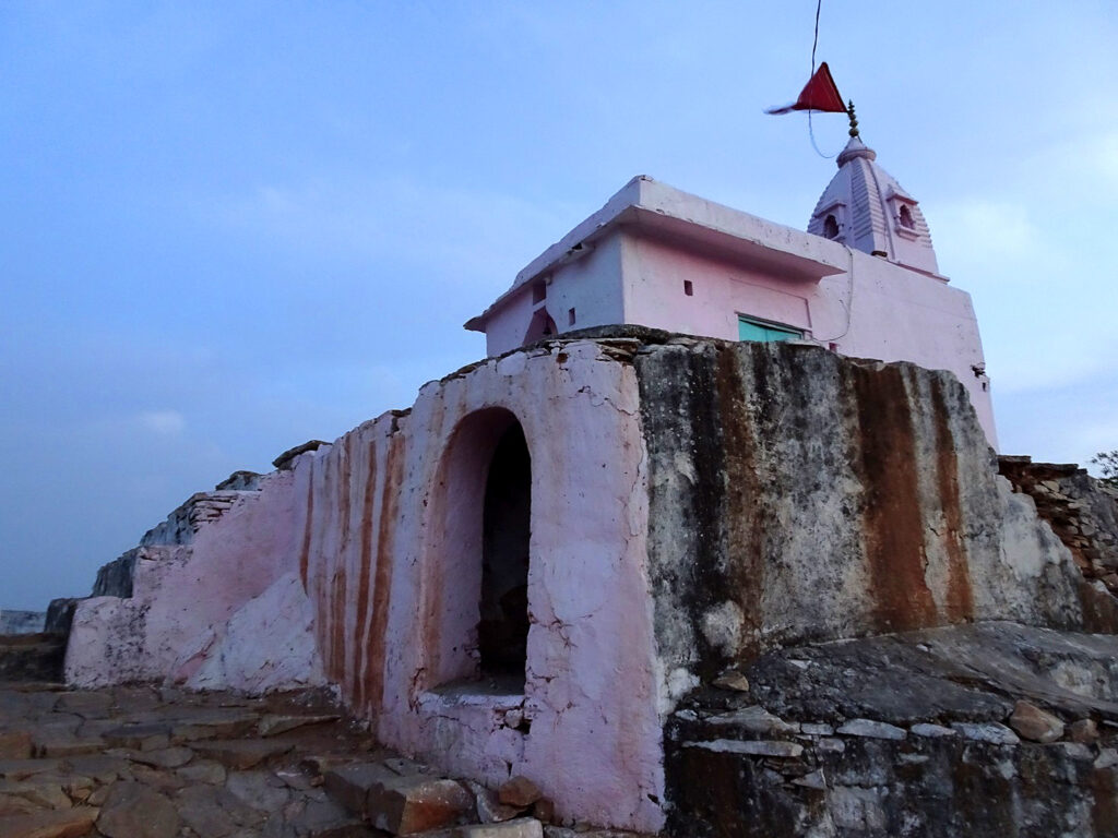 Pap Mochani (Gayatri) Temple, a pink-painted Hindu temple in Pushkar, Rajasthan